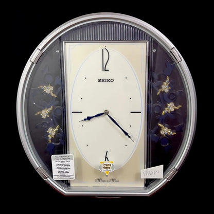 Seiko QXM158SRH "Sparkling Crystals" Melodies in Motion Musical Decorative Pendulum Wall Clock