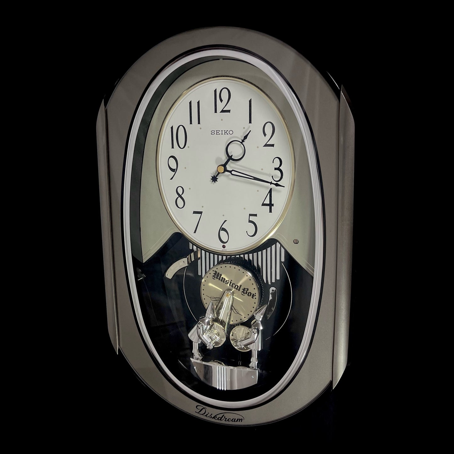 Seiko RE528S "Diskdream Music Box" Magic Motion Musical Wall Clock from Japan with Moving Figurines