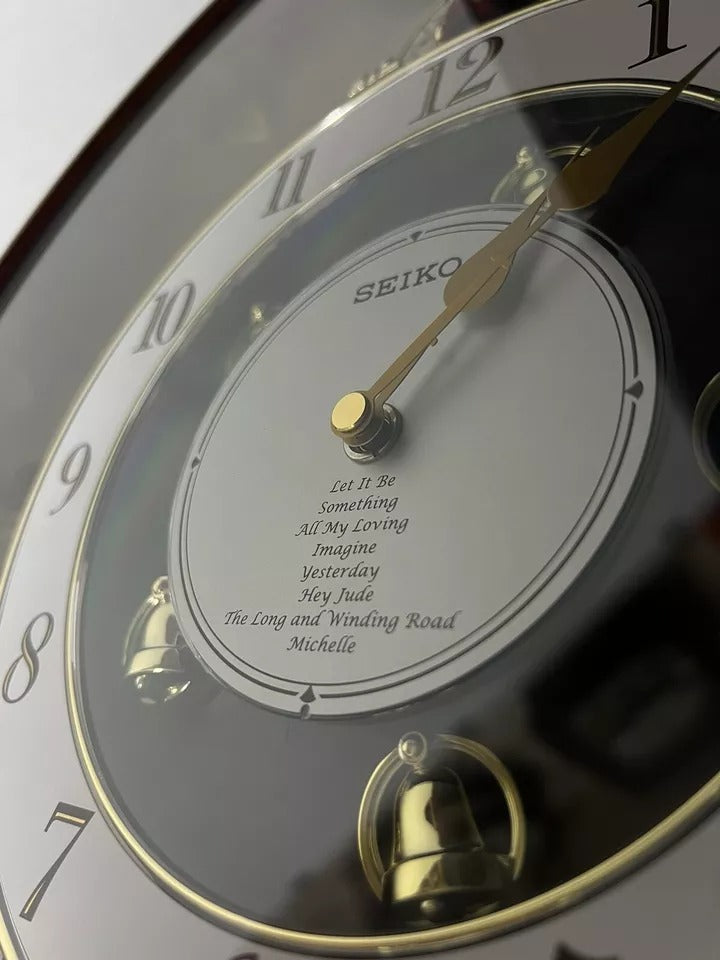 Seiko QXM134BRH "2005 Special Collector's Edition" Melodies in Motion Musical Moving Wall Clock with Music by The Beatles