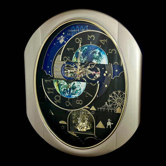 Rhythm “Timecracker 2000” Limited Edition Moving Earth Dial Magic Motion Musical Wall Clock with Popular Melodies - 4MH751NR19