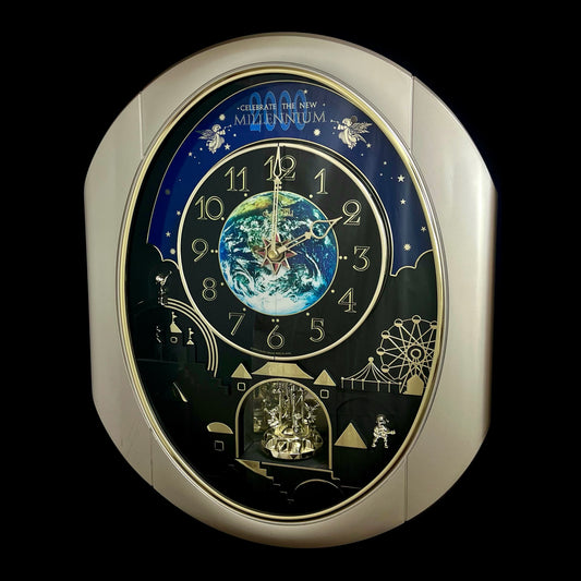 Rhythm “Timecracker 2000” Limited Edition Moving Earth Dial Magic Motion Musical Wall Clock with Popular Melodies - 4MH751NR19