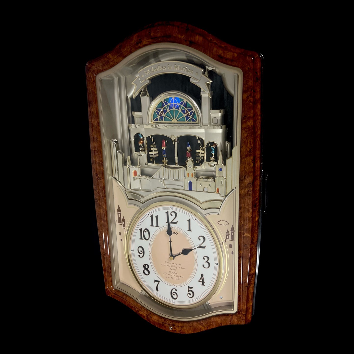 Seiko QXM135BRH "Lover's Castle" Melodies in Motion Musical Moving Wall Clock with Popular Melodies