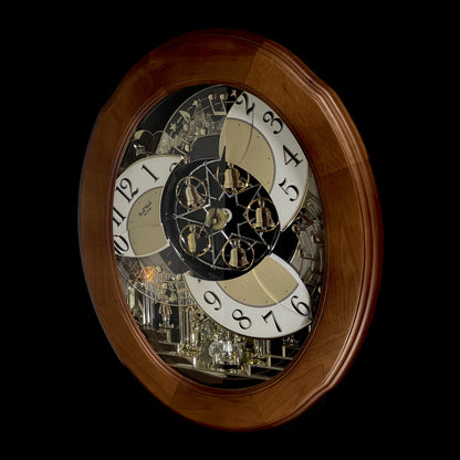 Rhythm "CTS Nostalgia" Moving Dial Magic Motion Musical Wooden Wall Clock with Popular Melodies - 4MH780-R06