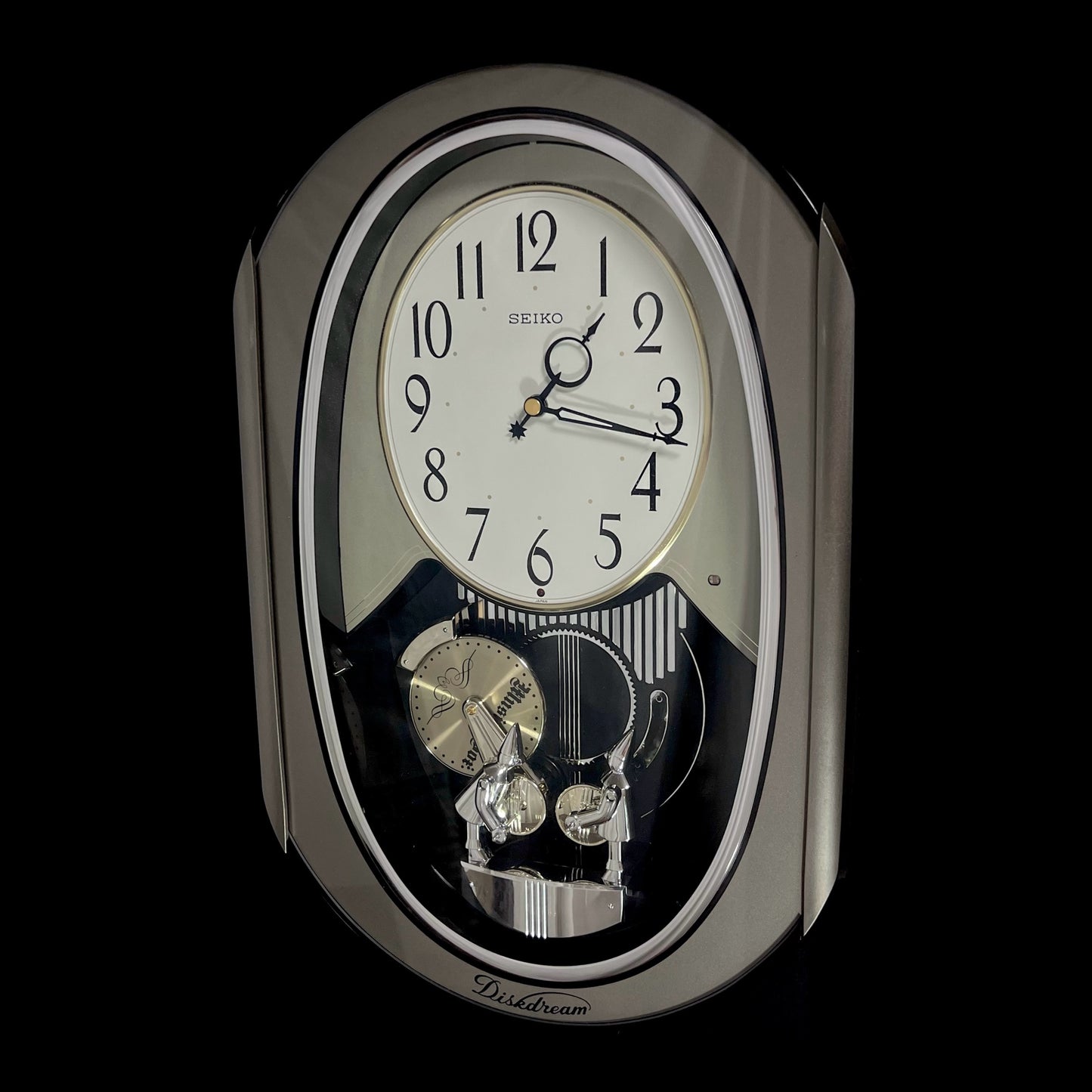 Seiko RE528S "Diskdream Music Box" Magic Motion Musical Wall Clock from Japan with Moving Figurines