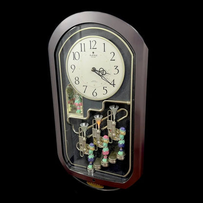 Rhythm "Trumpet Trio" Magic Motion Musical Wall Clock with Animated Figurines - 4MH712-R02