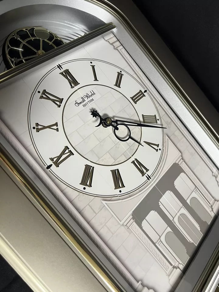 Rhythm “Renaissance” Magic Motion Musical Wall Clock with Moving Dial and Decorations - 4MH788-R18