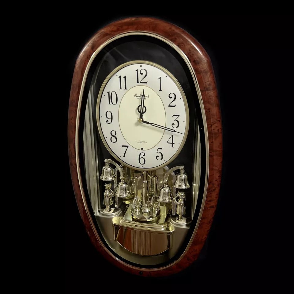 Rhythm "Golden Ringers" Magic Motion Musical Wall Clock with Animated Figurines - 4MH740NR23