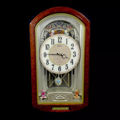 Seiko QXM123BRH "Broadway Showtunes Dropping Dial" Melodies in Motion Musical Moving Wall Clock