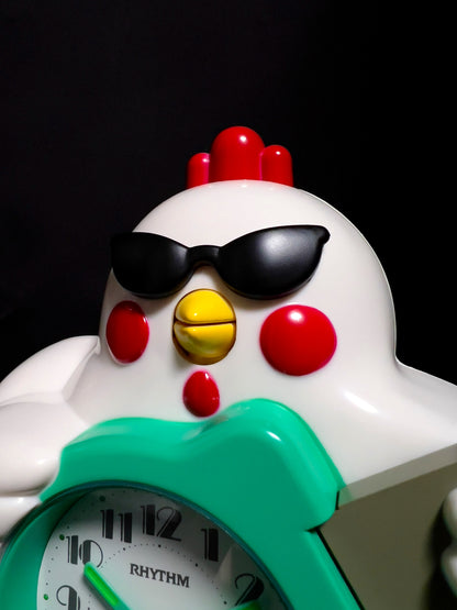 Rhythm “Rock n’ Roll Chicken” Novelty Musical Alarm Clock with Fun Singing Alarm Sound - CRE321UR03