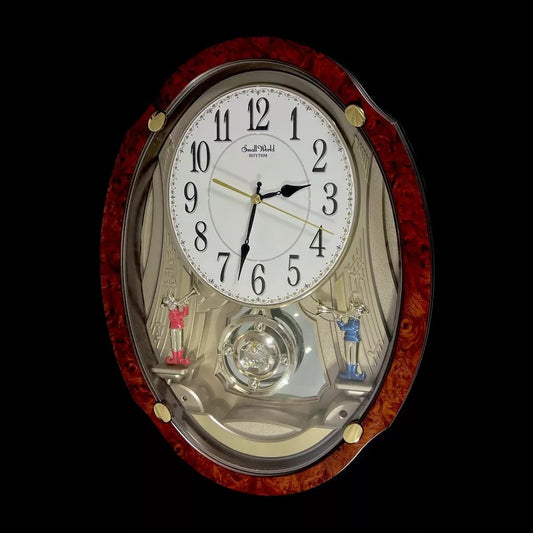 Rhythm "Trumpet Duet" Musical Motion Decorative Pendulum Wall Clock - 4MJ403WU23