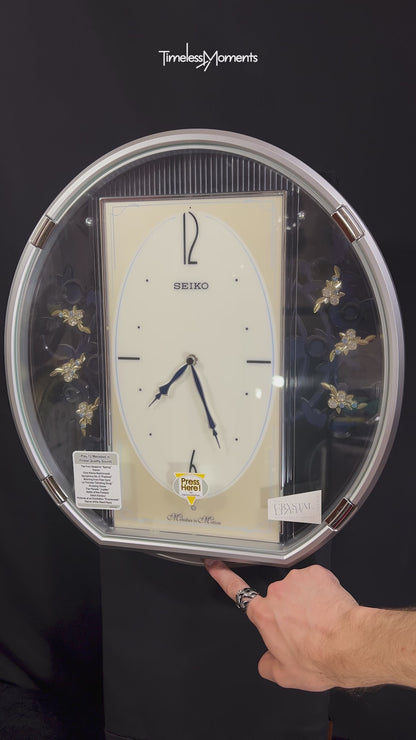 Seiko QXM158SRH "Sparkling Crystals" Melodies in Motion Musical Decorative Pendulum Wall Clock