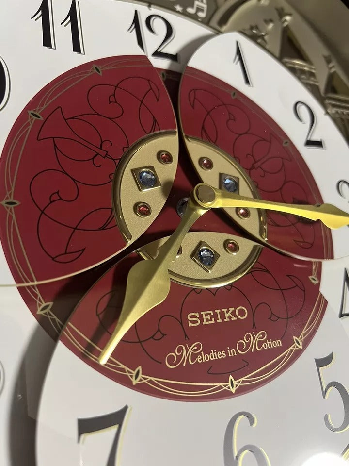 Seiko QXM565BRH "2016 Special Collector's Edition" Melodies in Motion Moving Dial Musical Wall Clock with Music by The Beatles